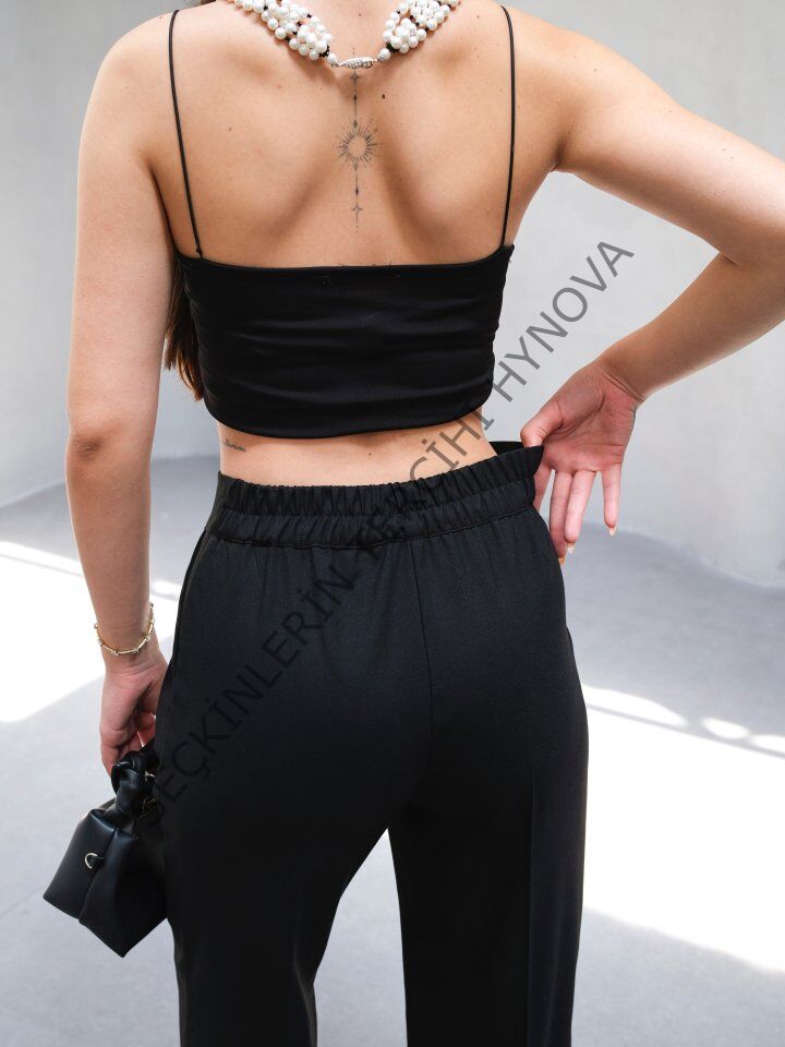 Arkasi Lasti̇kli̇ Pi̇leli̇ Dökümlü Wide Leg Pantolon