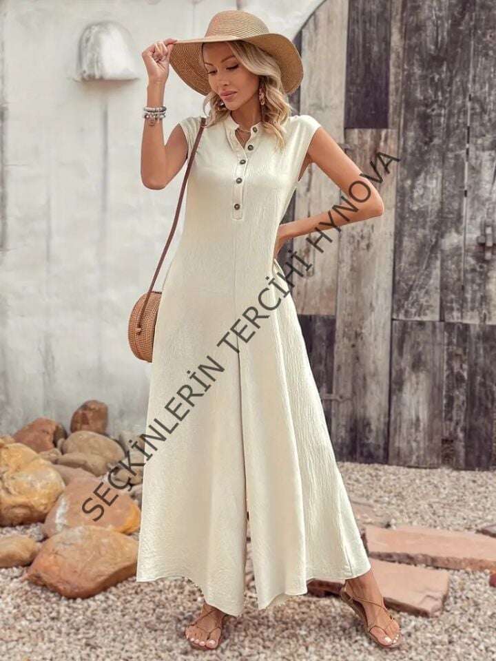 Kadın Kısa Kollu önden Düğmeli Paçaya Doğru Geniş Cepli Uzun Bürümcük Tulum